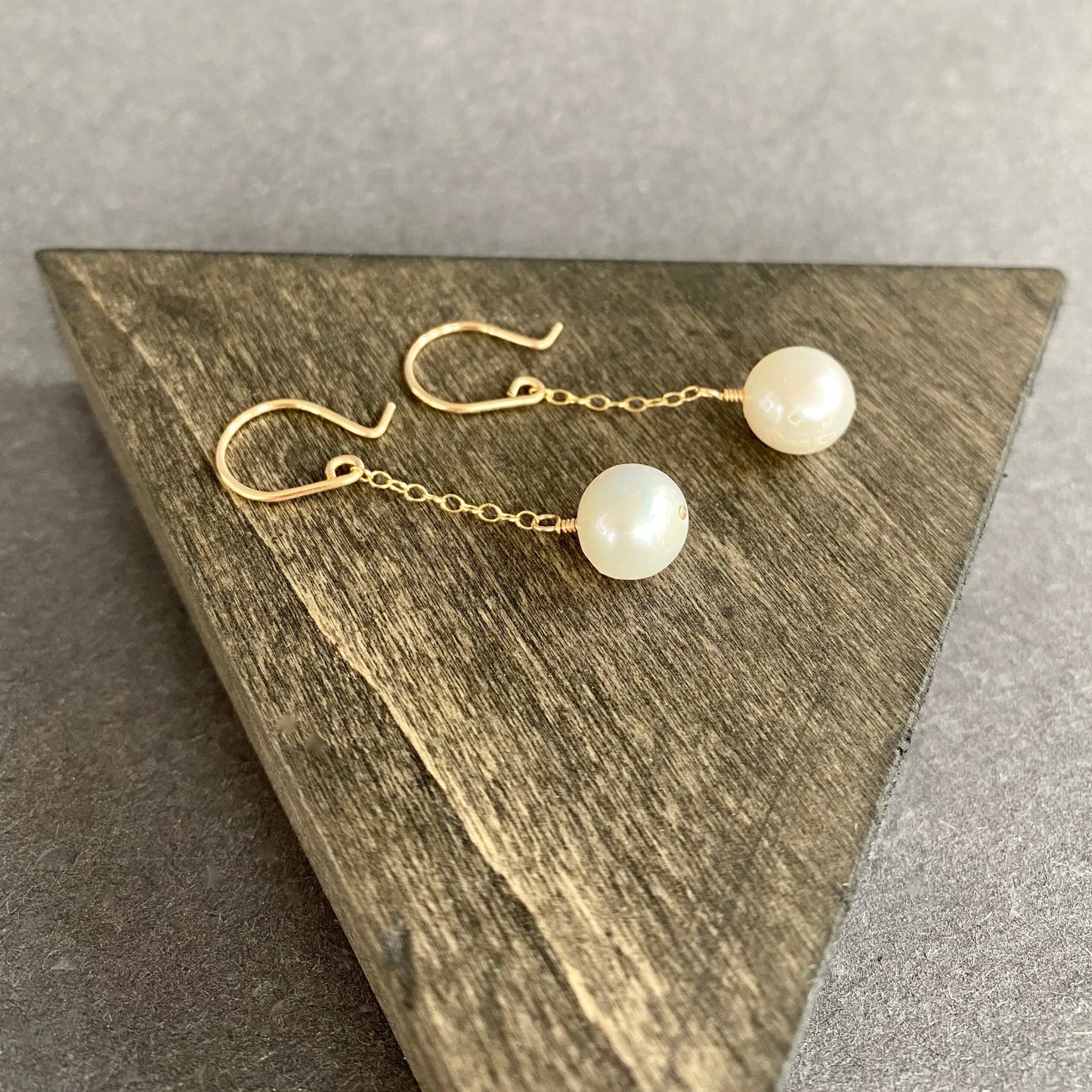 swingy white pearl earrings