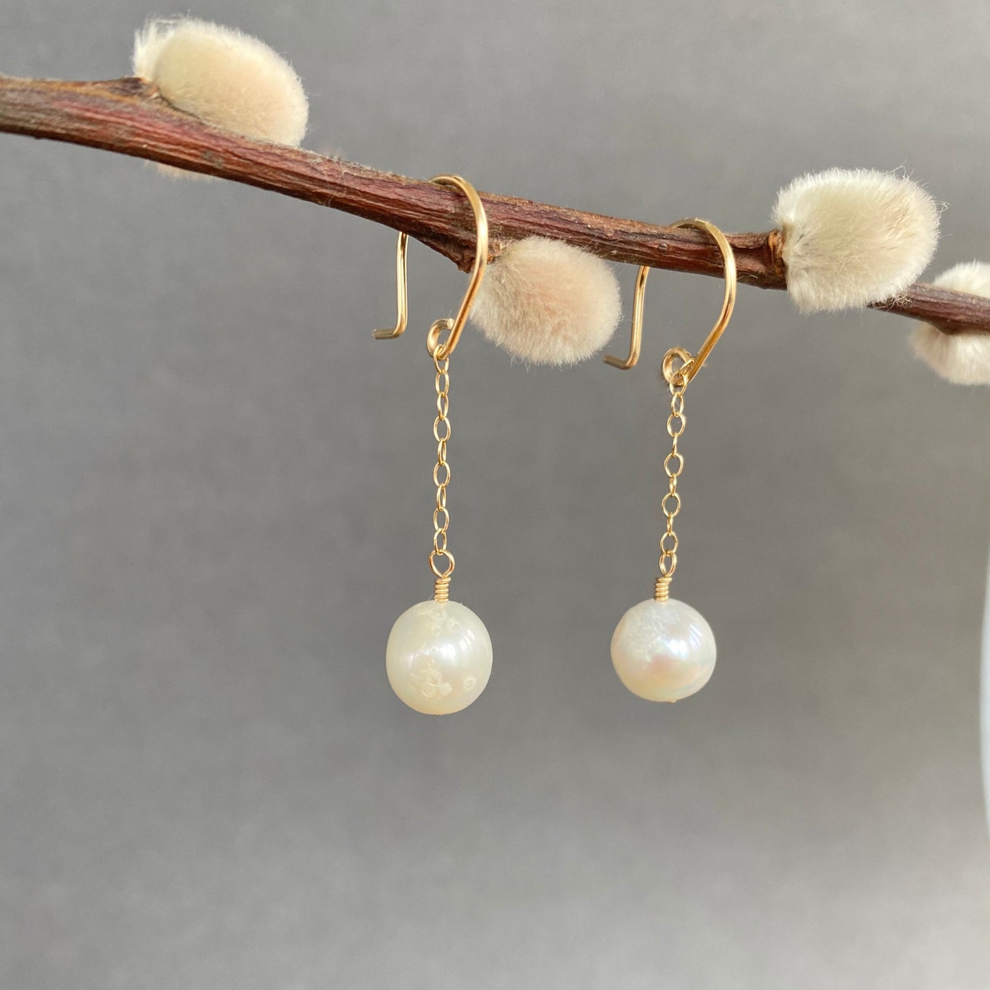 swingy white pearl earrings